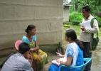Riturekha Baruah,Jr. Researcher ,Assam (in blue) interviewing a victim of conflict situation .