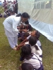 Children of Lowkiwali Feeder School being given Vitamin A at a health camp in Dibrugarhs Mesaki Sapori.