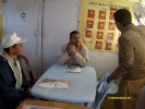 Dr.  B.C Borah, Medical Officer, Dibrugarh Boat Clinic briefing about immunisation to the  DC and Dr. PC Hazarika , JDHS Dibrugarh