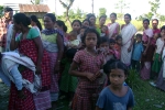 Women and children at Tinsukia\'s Laika Pomua L P School, waiting for the awareness and handwashing day to be observed at the sapori school as part of the C-NES- Unicef  initiative .