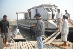 Sanjoy Hazarika inspecting the new boat being built for the Jorhat Boat  Clinic, (donated by Oil India Ltd) at Kamalabari Ghat