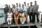 Anna (sitting middle) with the Jorhat Boat Clinic team at Sikari Ghat.