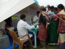 Medical Officers of the Dibrugarh Boat clinic conducting a routine monthly health camp at Aichung sapori, of Dibrugrah where UNICEF shot a documentary film capturing a health camp in progress.