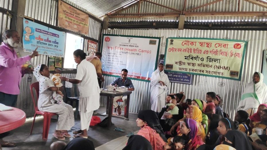 Members of the boat clinic conducting an awareness meeting to discuss the detrimental effects of child marriage on women's health and the significance of routine health check up of pregnant mother