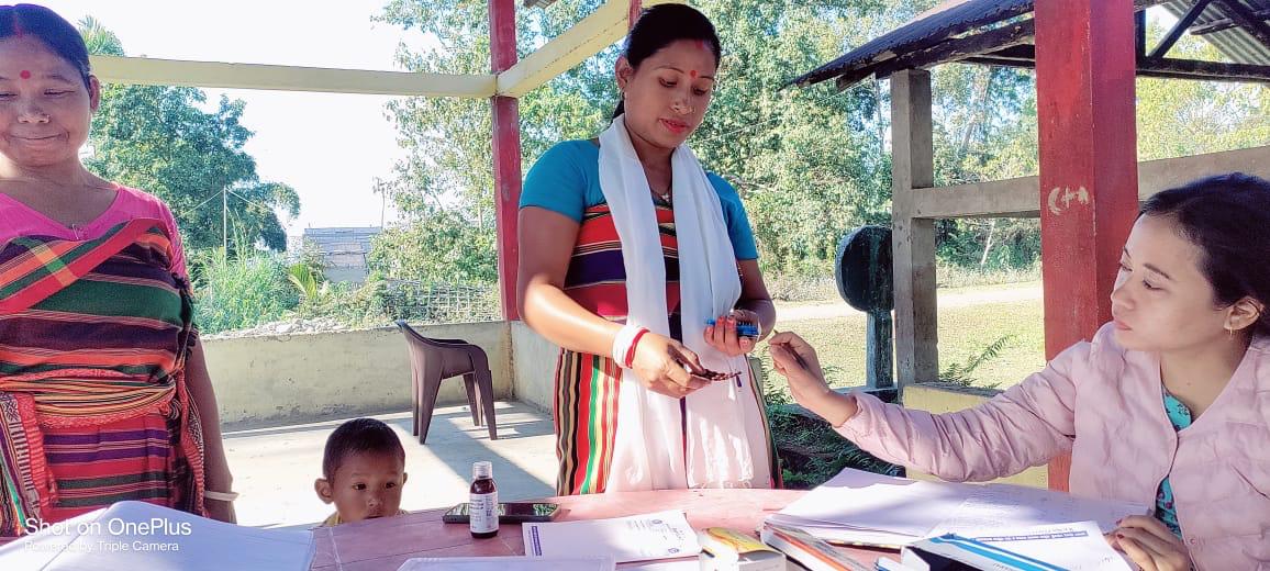 A health camp conducted by the Dhemaji Boat Clinic at Nalbari island village