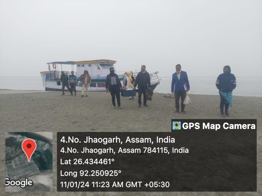 The Morigaon Boat Clinic team on way to a camp at Barkur char on a misty January morning