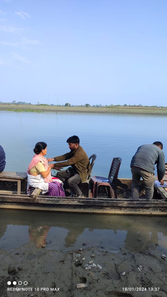 Beneficiaries on way to regular camps (above) conducted by the Lakhimpur Boat clinic unit