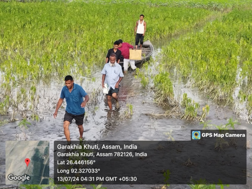 The Morigaon Boat Clinic team on way to conduct health camp through flooded villages. 13th July 2024